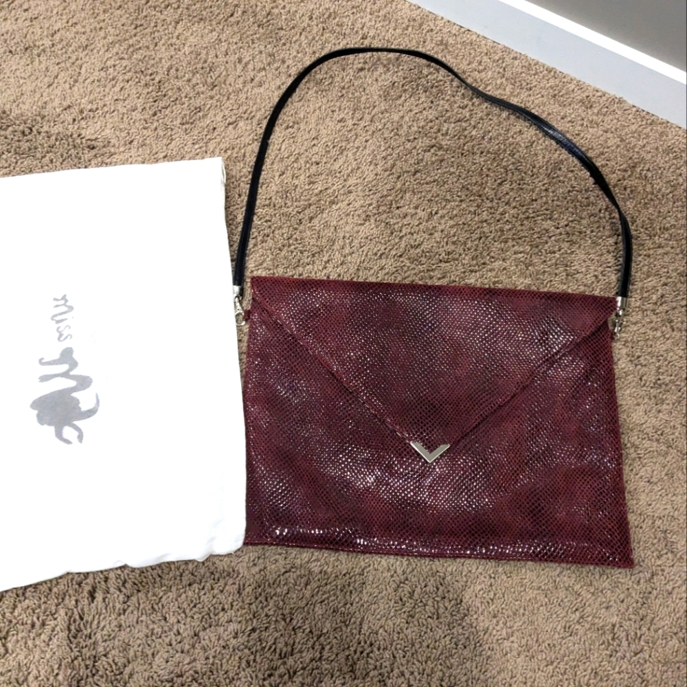 Miss Mak Leather oversized envelope clutch.